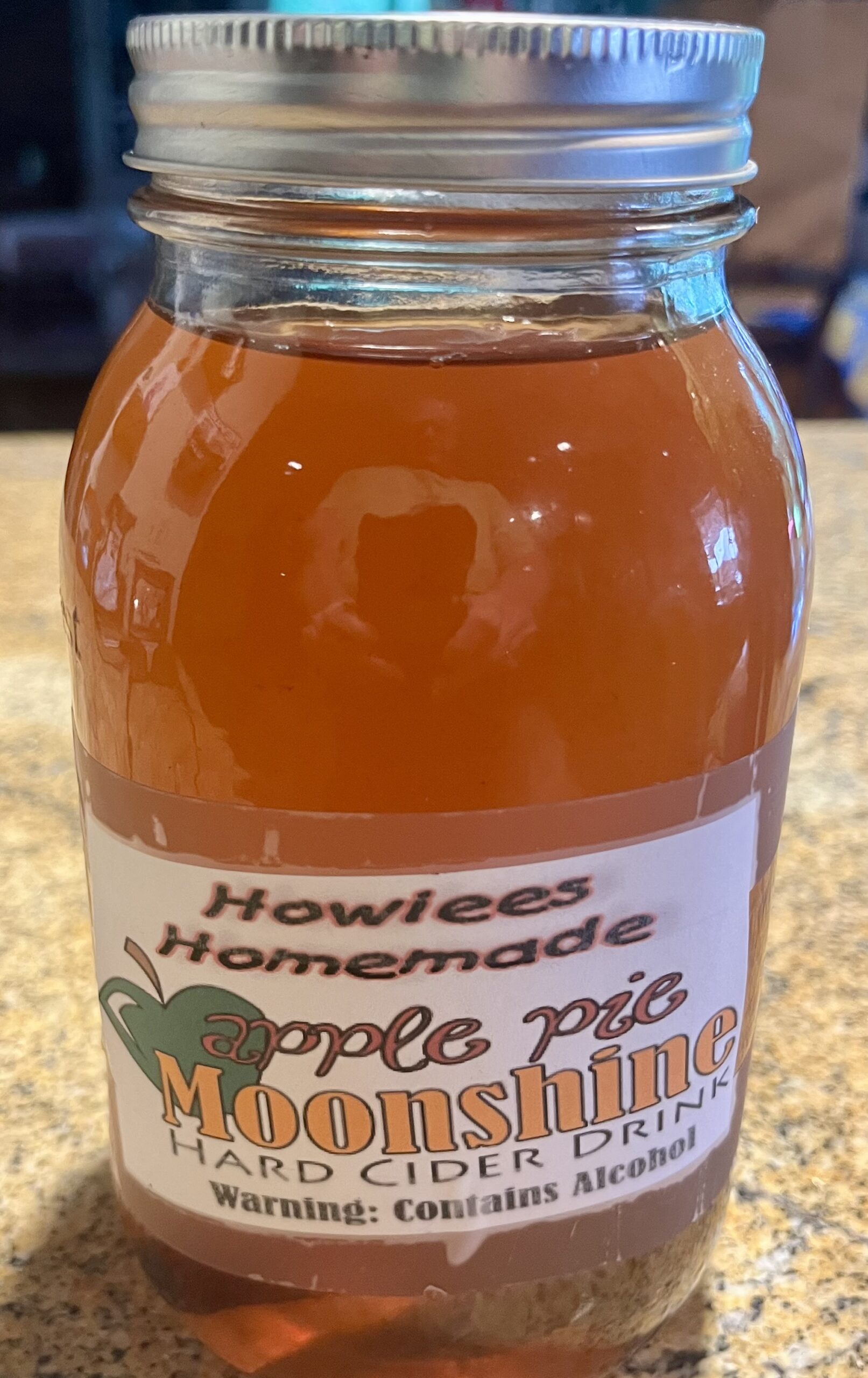 Item FW 9 - Oh BOY!  A quart of Home-made, Apple Pie Flavored Moonshine valued at $28