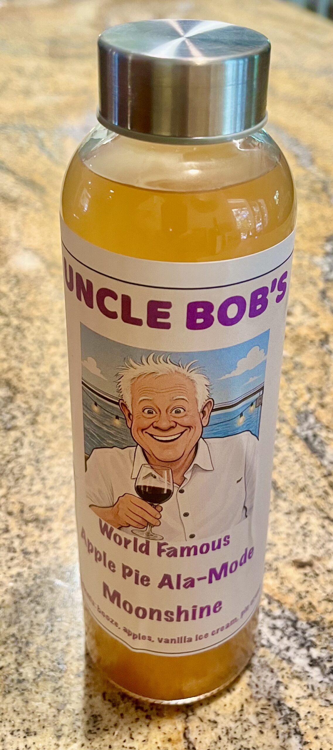 Item FW 14 - One 17.5 ounce Bottle of Uncle Bob's Home made Apple Pie Ala-Mode Moonshine, valued at $20