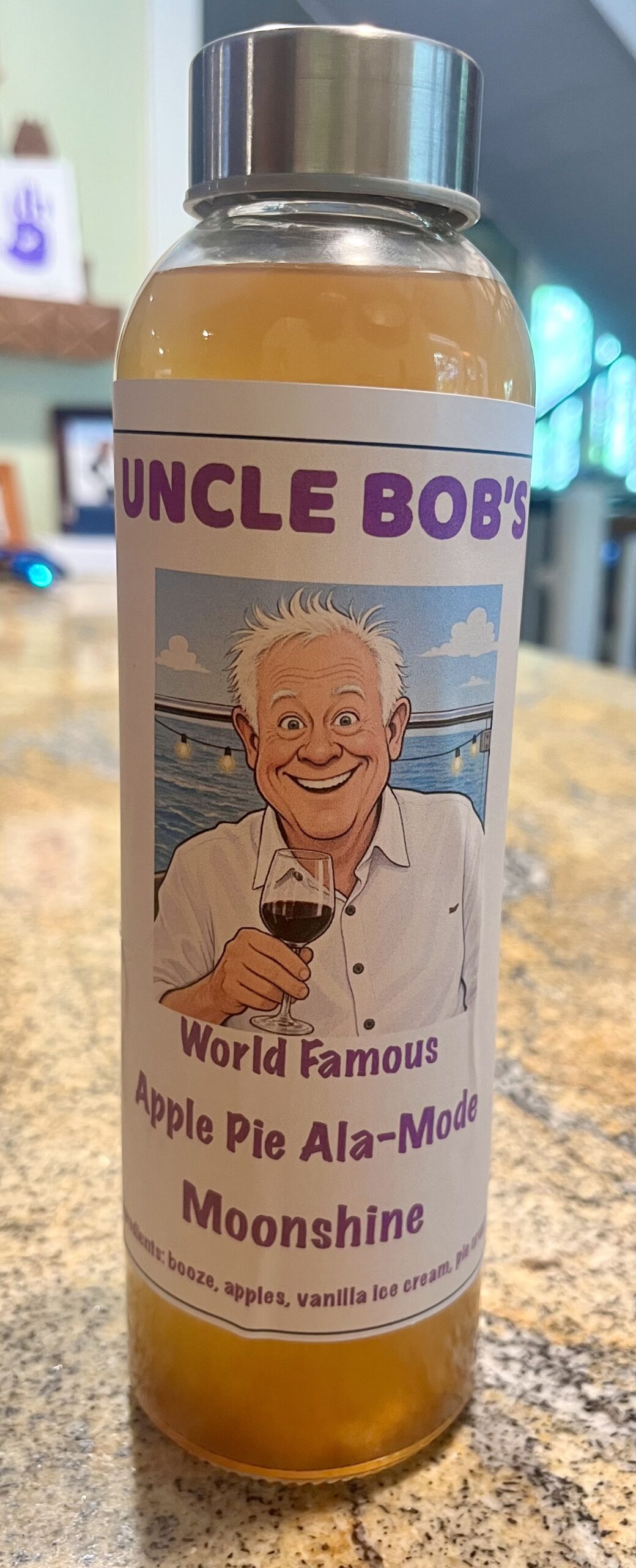 Item FW 13 - One 17.5 ounce Bottle of Uncle Bob's Home made Apple Pie Ala-Mode Moonshine, valued at $20